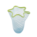 Glass vase with wavy design and green rim on a white background