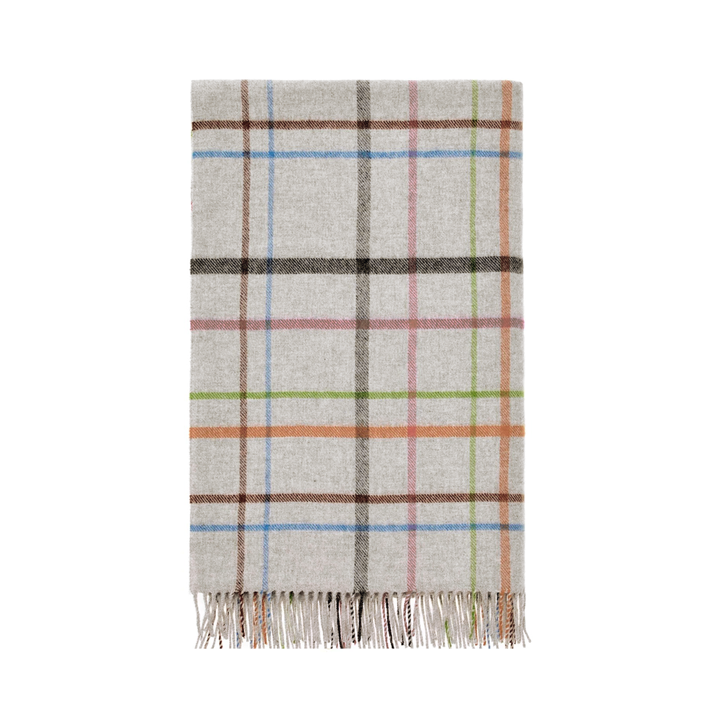 A folded plaid throw blanket with a light grey base and multicolor lines in brown, green, pink, and blue, finished with a fringed edge.