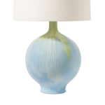 Table lamp with a decorative blue and white base on a white background