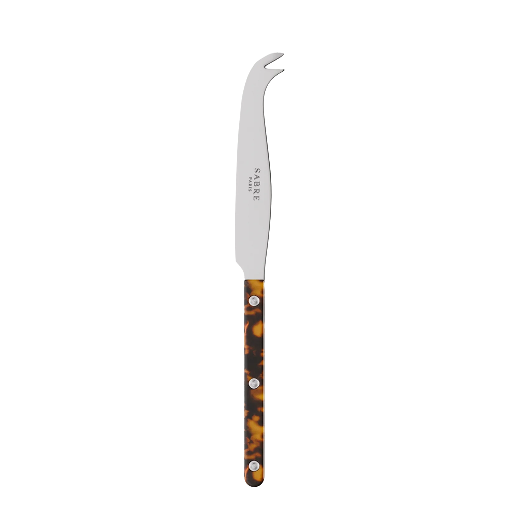 Tall dark-colored knife on a white background