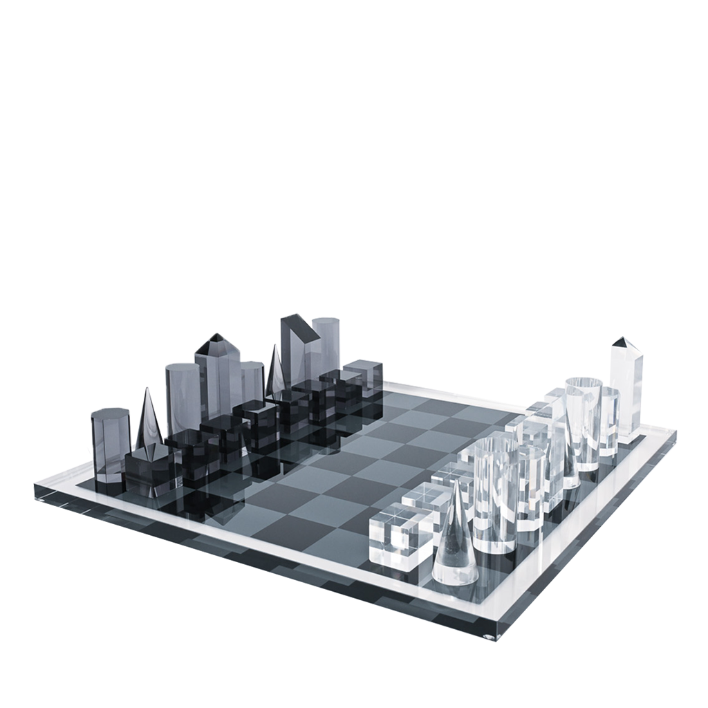 Modern chess set with black and clear pieces on a checkered board