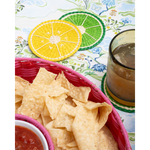 pink chip and dip server with salsa on a blue patterned tablecloth