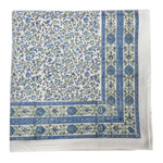 Floral patterned fabric with blue and green accents on a white background