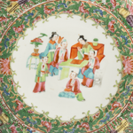 Decorative plate with colorful floral and figural design