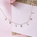 Seven station diamond necklace in gold