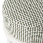 Close-up of a green and white checkered cushion on a chair.