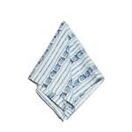 A folded napkin featuring a blue and navy floral pattern and vertical stripes, displayed on a clean white background.