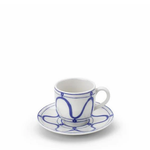 Ceramic cup and saucer with blue patterns on a white background