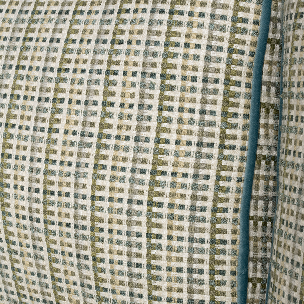 Close-up of a textured fabric with a checkered pattern in green, beige, and brown.