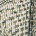 Close-up of a textured fabric with a checkered pattern in green, beige, and brown.