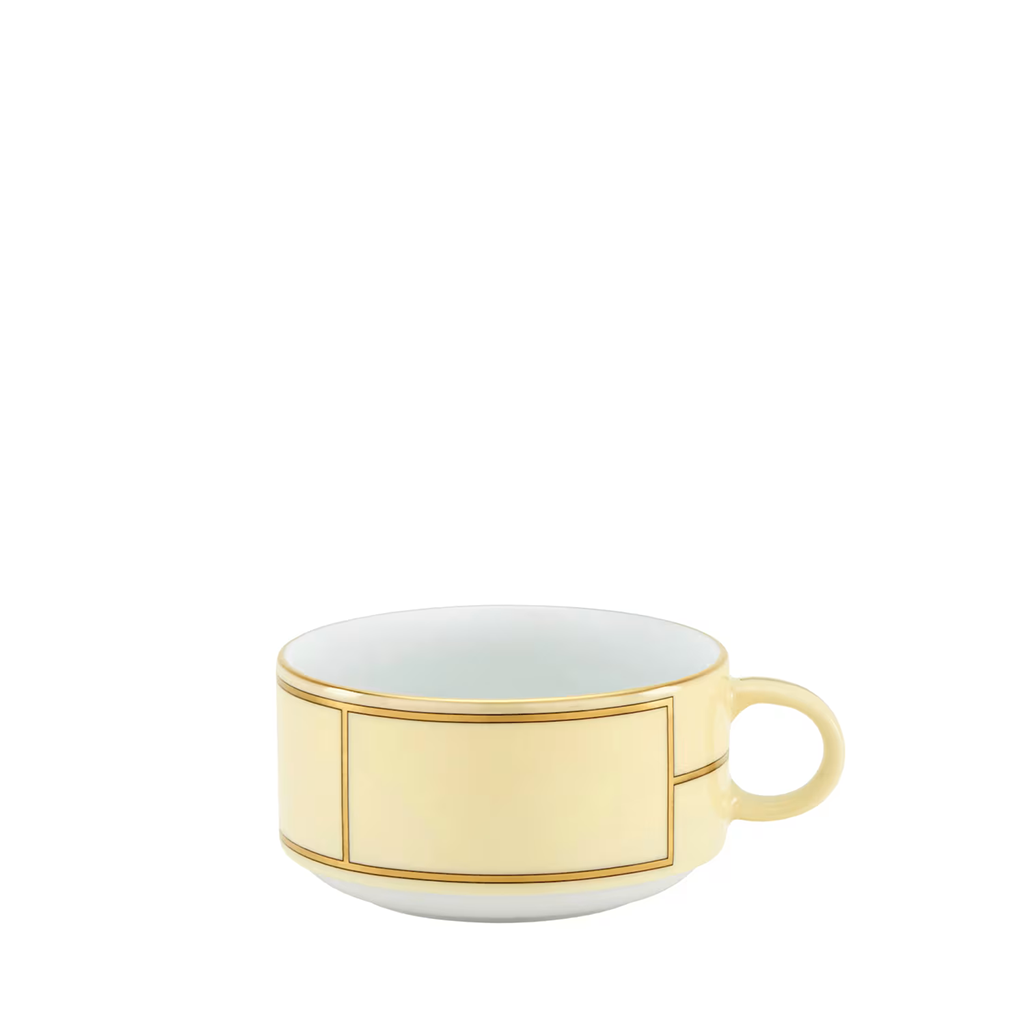 yellow and gold teacup