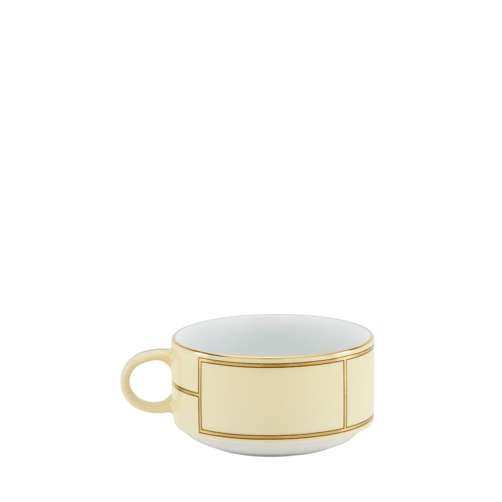 yellow and gold tea cup