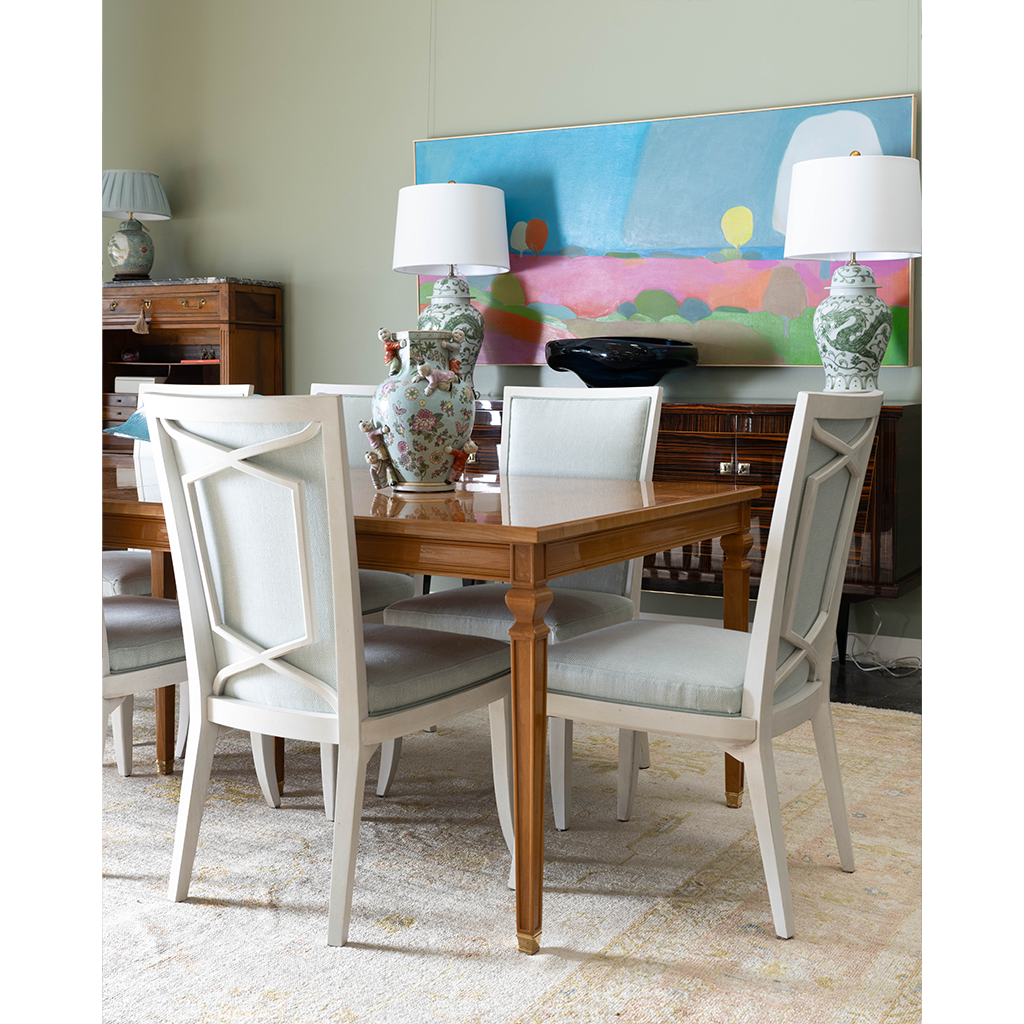 light brown dining table with chairs