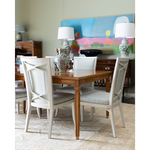 light brown dining table with chairs