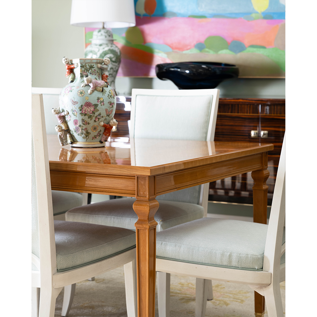 light brown dining table with chairs