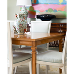 light brown dining table with chairs