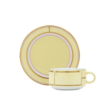 yellow and gold teacup and saucer