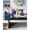 wing and a prayer pillow on top of navy blue couch