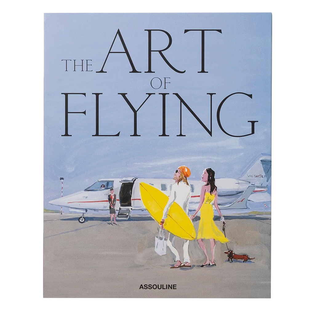 Book cover of 'The Art of Flying' by Assouline with illustration of two women and a dog near a private jet.
