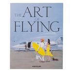 Book cover of 'The Art of Flying' by Assouline with illustration of two women and a dog near a private jet.