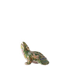 Decorative frog figurine with intricate patterns on a white background