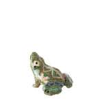 Decorative frog figurine with intricate patterns on a white background
