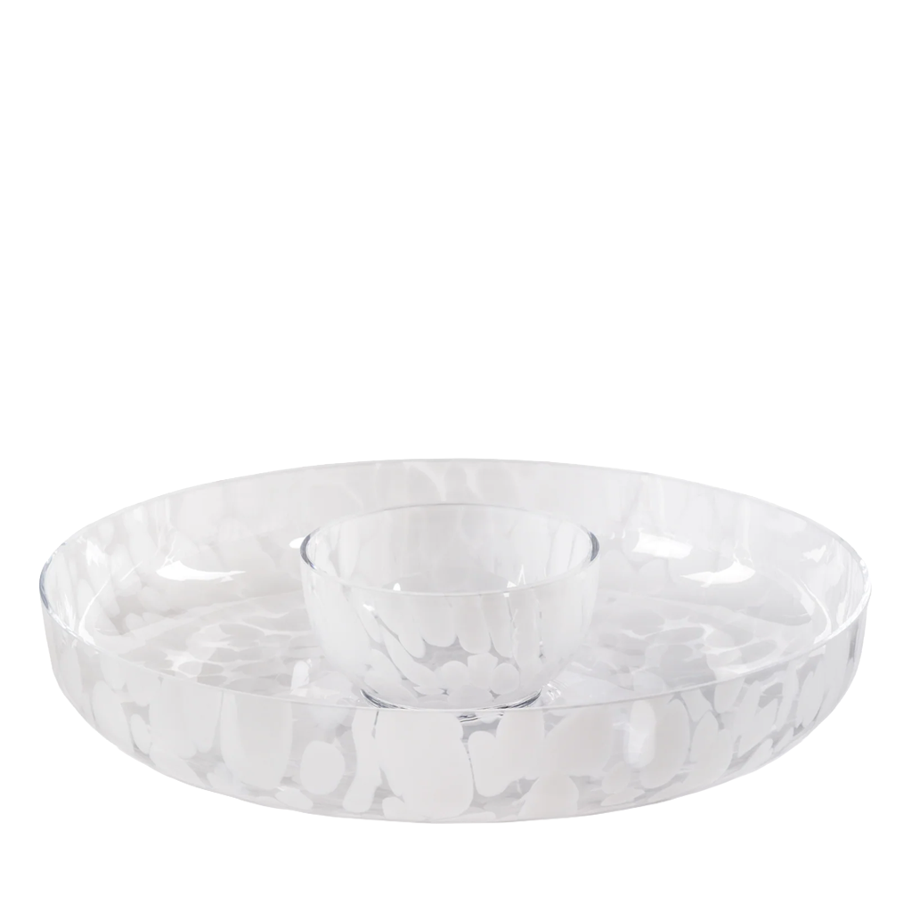 Clear glass bowl with confetti pattern on a white background