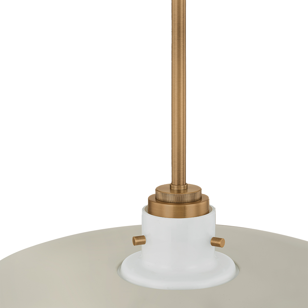 Close-up of a pendant light fixture showing a white circular shade flange, a brass metal socket and rod, and part of a light-colored round shade against a white background.
