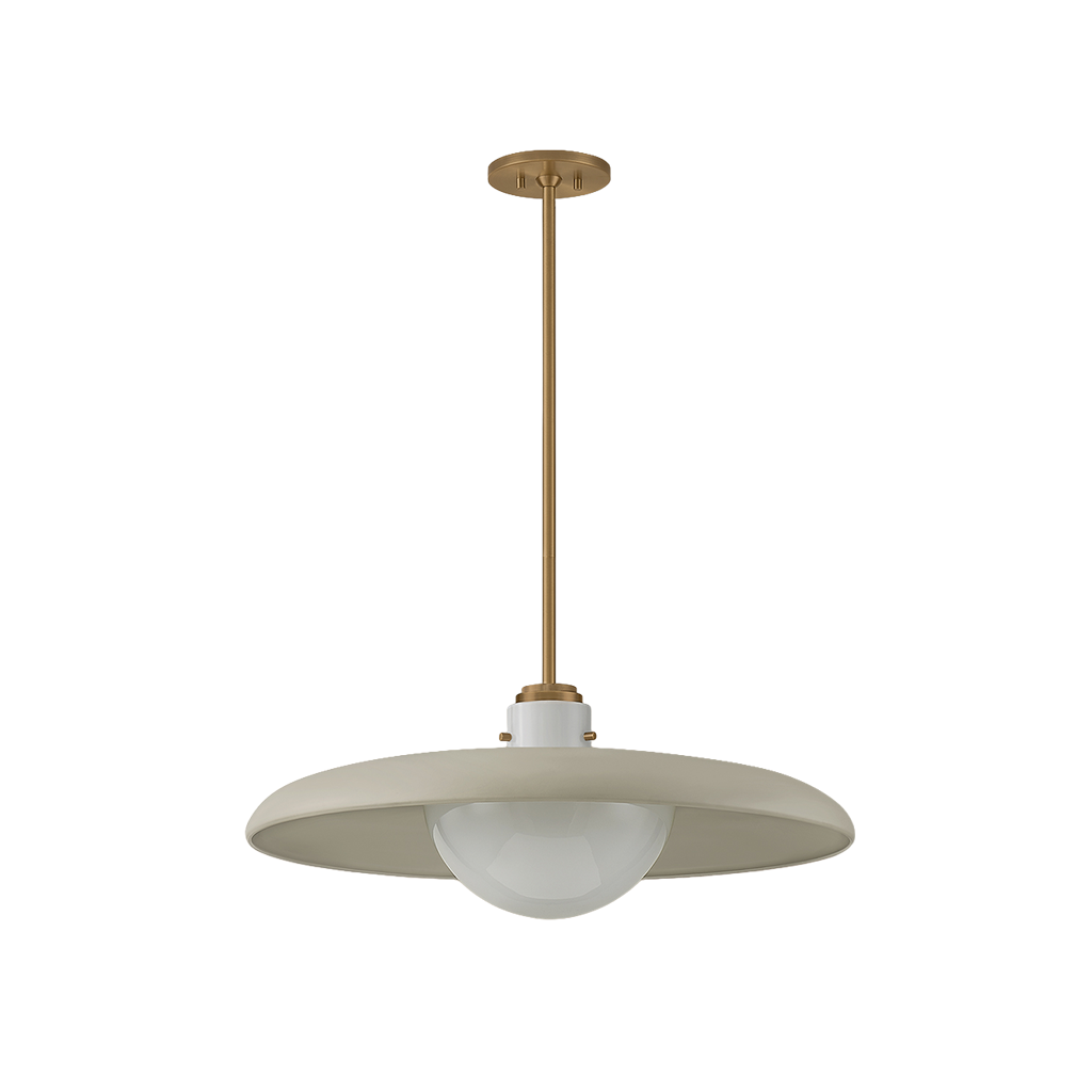 A modern pendant light fixture with a wide, shallow dome-shaped shade in a warm beige finish, a white frosted glass globe bulb, and a vertical brass suspension rod.