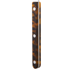Tortoiseshell patterned handle on a white background