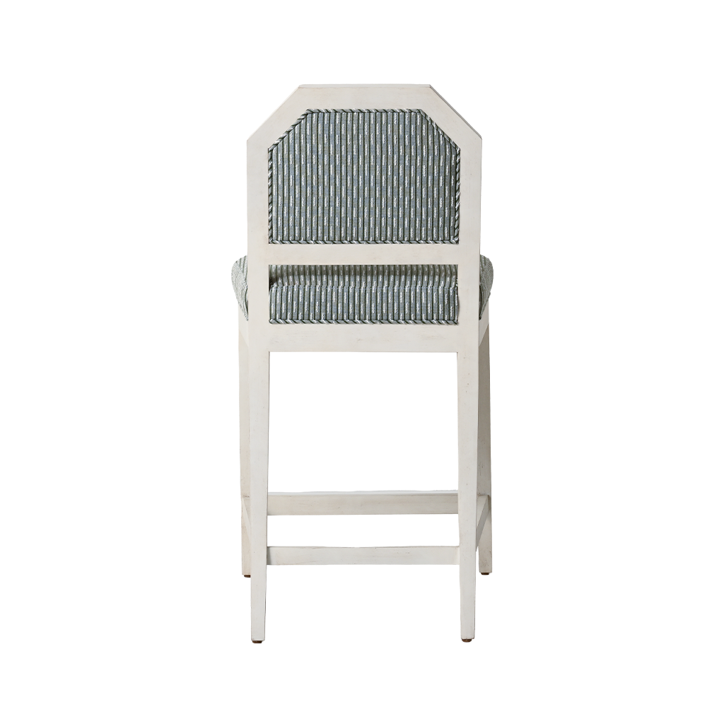 White chair with a striped cushion on a white background
