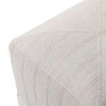 Close-up of a textured fabric surface with subtle pattern