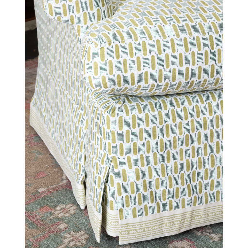 closeup of a blue and green patterned chair