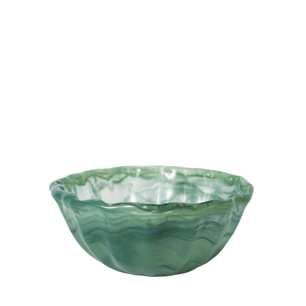Green glass bowl on a white background