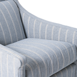 Close-up of a blue and white striped armchair