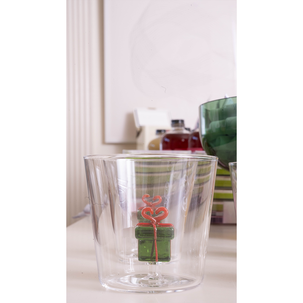 Clear tumbler with glass present