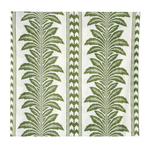 white tablecloth folded into a square with a green palm tree striped pattern on a white background