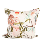 Decorative pillow with nature-themed design on a white background