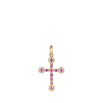 Gold cross pendant with pink gemstones on a white background