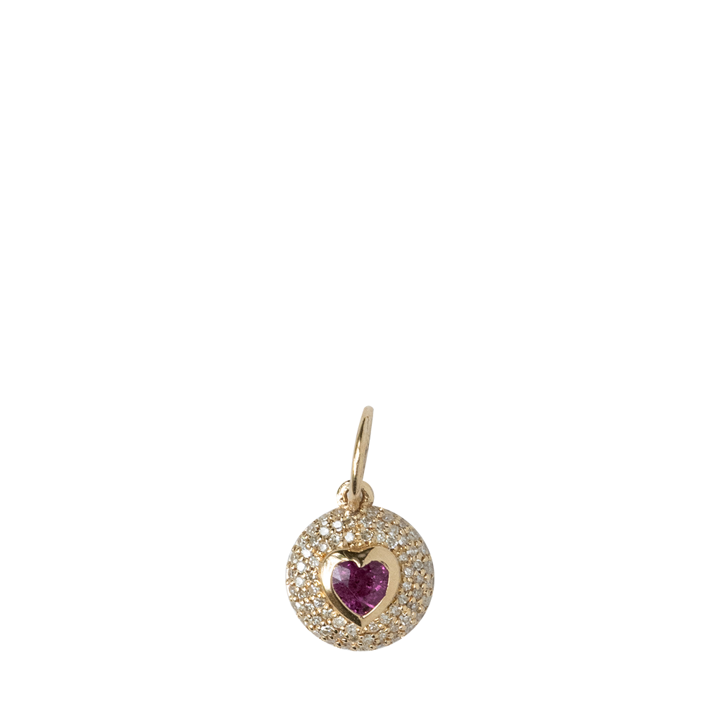 Gold pendant with gemstones on a white background