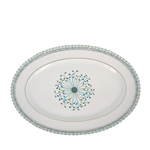 Decorative oval platter with a central floral design on a white background