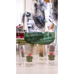 Clear tumbler with glass present