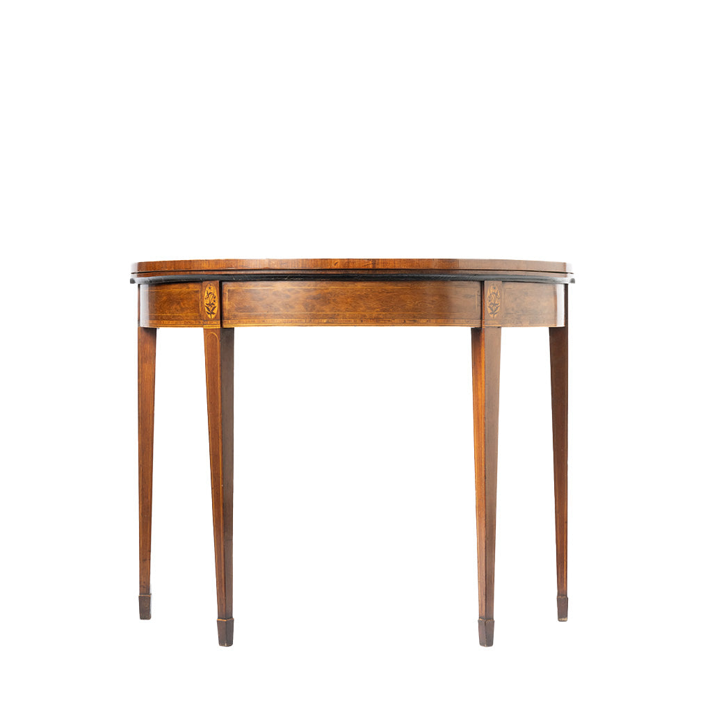 A side view of a round demi-lune console table with tapered legs and decorative inlays, shown against a plain white background.