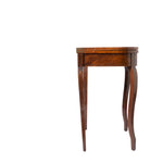 A small wooden side table with a single drawer and curved cabriole-style legs, shown against a plain white background.