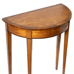 A vintage-style wooden console table with a semi-circular half-moon top, featuring a warm medium-brown wood finish and four slender legs, shown against a plain white background.