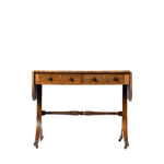 An antique wooden writing desk with two drawers, turned legs, and a central stretcher bar, shown against a plain white background.