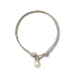 A silver-toned braided cord bracelet with a knotted toggle and a single white pearl pendant, shown on a clean white background.