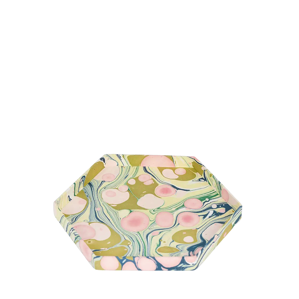 Hexagonal tray with marbled design on a white background