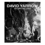 Book cover for 'David Yarrow Storytelling' featuring a black and white photograph of a cowboy on horseback, another rider, and a steam locomotive with smoke, with the title in large white text at the top.