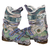 Pair of colorful patterned ski boots on a white background